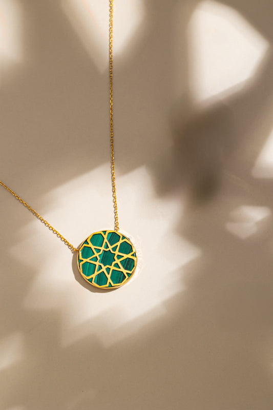 Arabie Necklace crafted in 18k yellow gold with natural green Malachite stone.