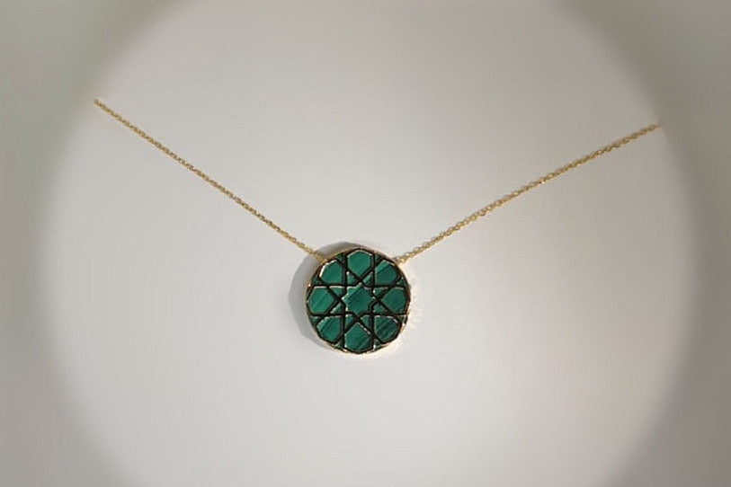 Arabie Necklace crafted in 18k yellow gold with natural green Malachite stone.